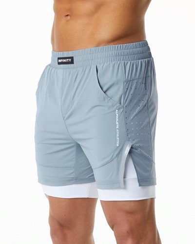 Alphalete Compression Forro Woven Entrenamiento Corta Azules | EWUTJF201