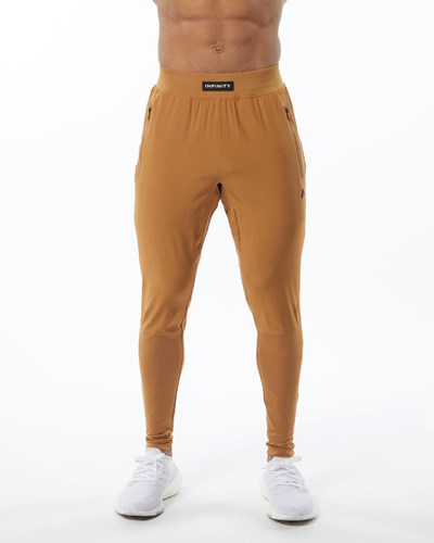Alphalete Woven 4-Way Stretch 29" Pant Chestnut | CYHPXL312