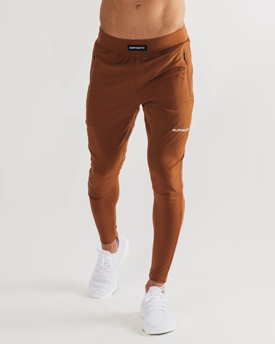 Alphalete Woven 4-Way Stretch 29" Pant Spice | PQVSOE480