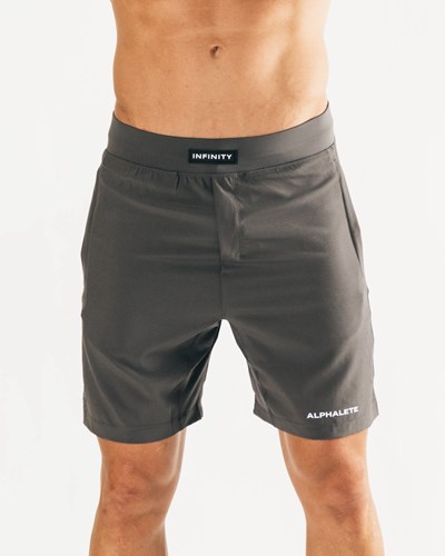 Alphalete Woven 4-Way Stretch 7" Corta Gris Oscuro | SVBWTJ425