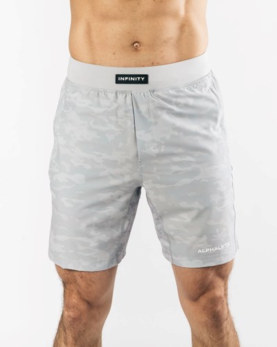 Alphalete Woven 4-Way Stretch 7" Corta Plateadas | HNCMPZ269